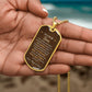 To Our Son Necklace from Mom & Dad – gold dog tag held in hand to show size