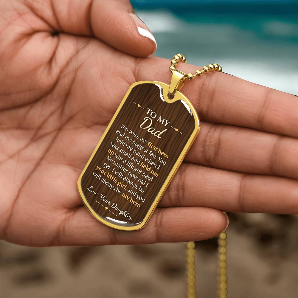 To My Dad Necklace from Daughter – gold dog tag held in hand to show size