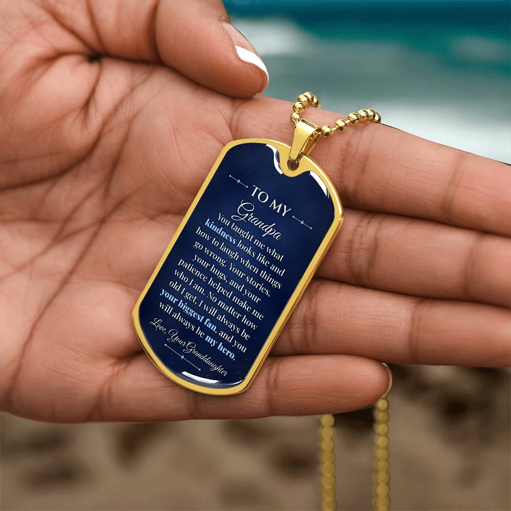 To My Grandpa Necklace from Granddaughter – gold dog tag held in hand to show size