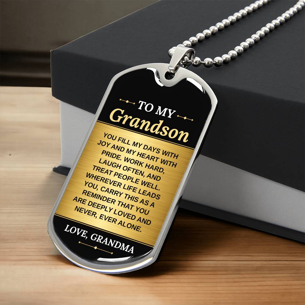 To My Grandson Necklace from Grandma – silver dog tag necklace resting on a gift box