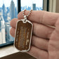 To My Man Necklace from Wife – silver dog tag held in hand to show size