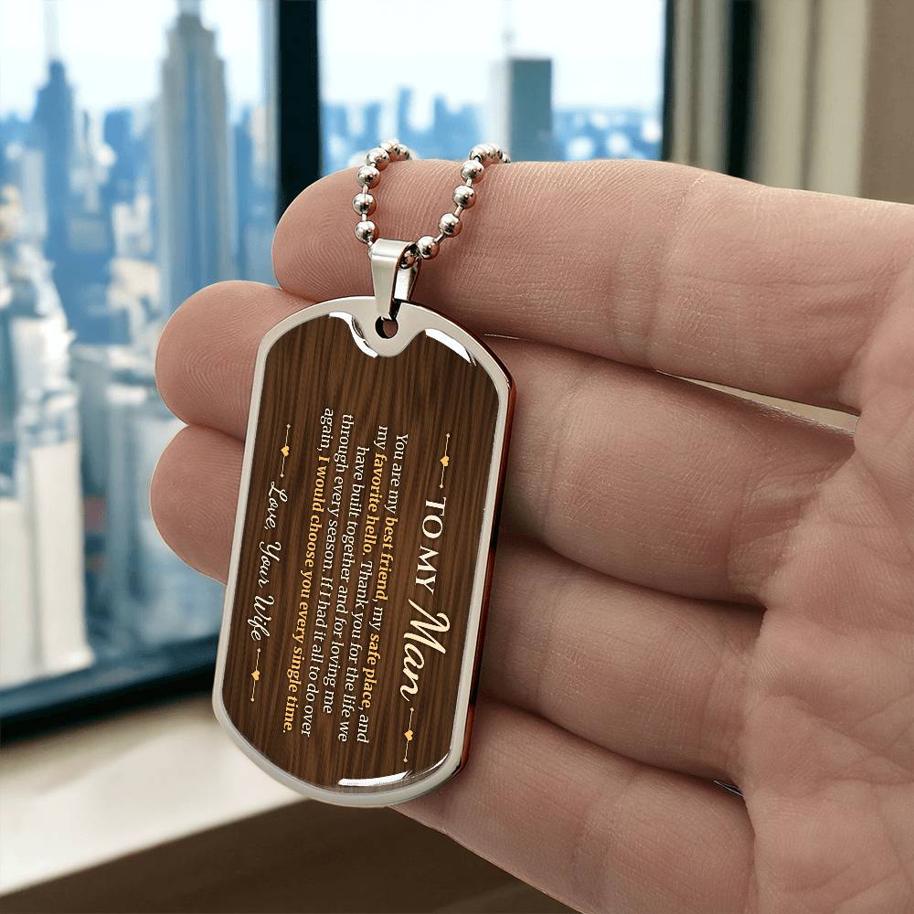 To My Man Necklace from Wife – silver dog tag held in hand to show size