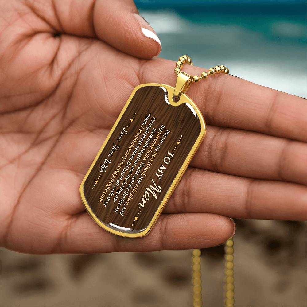 To My Man Necklace from Wife – gold dog tag held in hand to show size