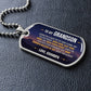 To My Grandson Necklace from Grandpa – dog tag necklace laid flat on a dark background