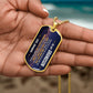 To My Grandson Necklace from Grandpa – gold dog tag held in hand to show size
