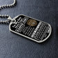 Silver Old Lion son dog tag lying on black leather