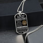 Silver Old Lion son dog tag hanging over a black gift box