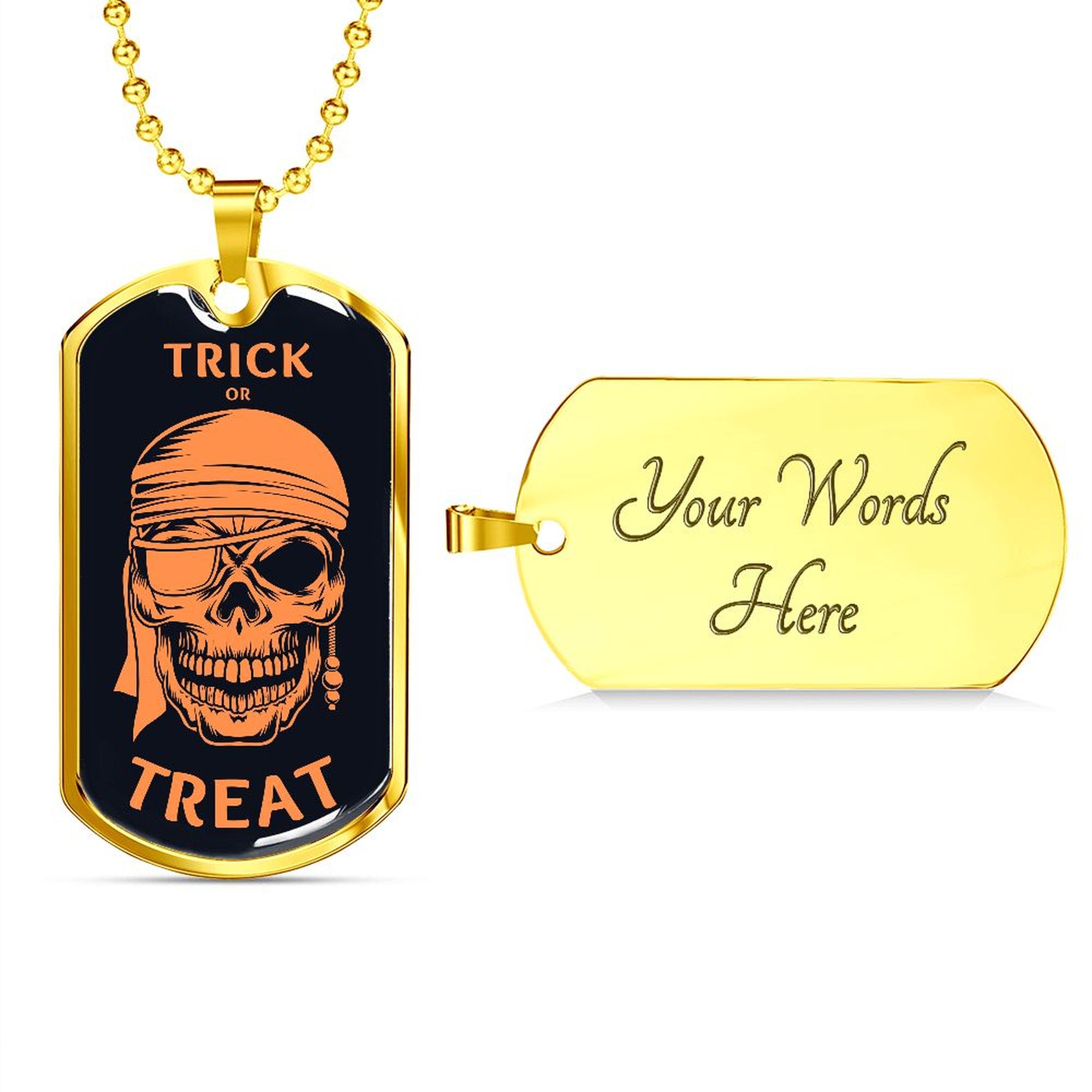 Front of the gold Trick or Treat pirate skull tag beside an engravable gold back reading Your Words Here