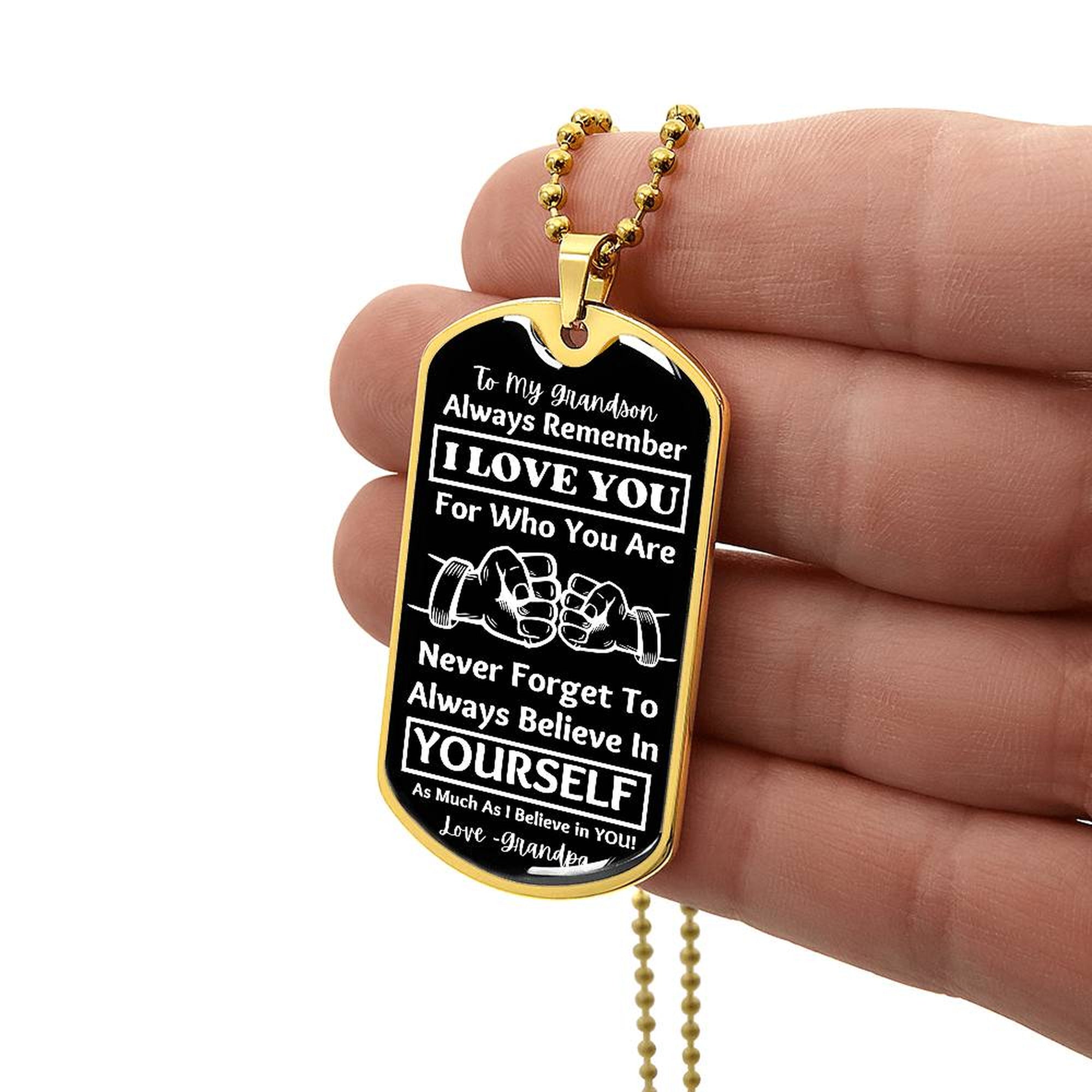 To My Grandson, From Grandpa Dog Tag – gold dog tag held in hand to show size