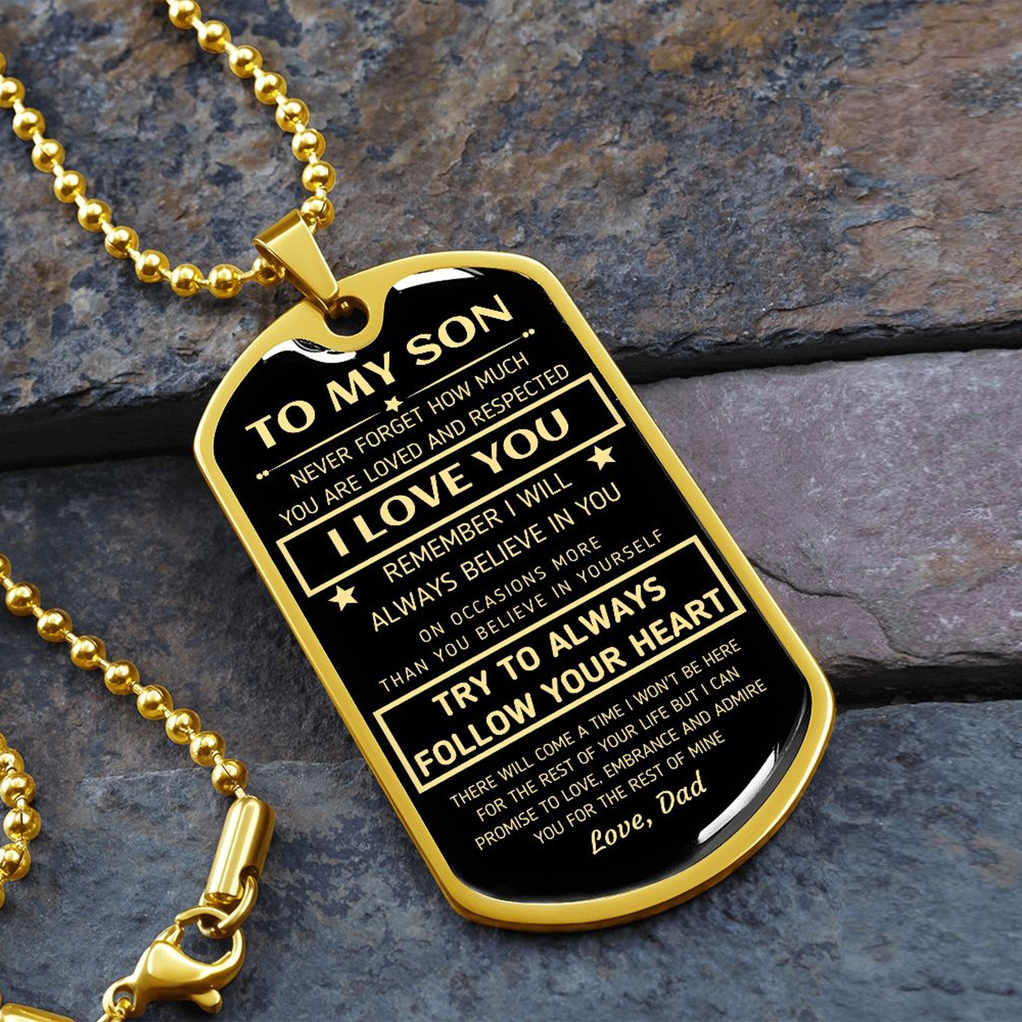 Gold-finish To My Son dog tag necklace on slate stone