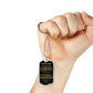 Silver To My Son dog tag hanging from a closed fist